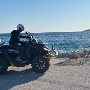 Quad rider on a coastal route during a guided Korčula tour